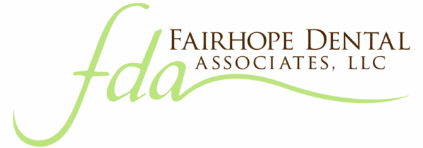 The logo for "Fairhope Dental Associates, LLC" features the letters "fda" in light green cursive font. To the right, the full name appears in brown capital letters against a transparent background with a checkered pattern.