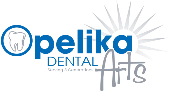 Opelika Dental logo with stylized tooth and rays design.