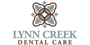 Lynn Creek Dental Care logo featuring an abstract floral design above the text.
