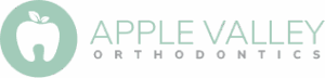 Apple Valley Orthodontics logo featuring an apple and tooth design, representing orthodontic services and branding.